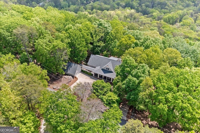 bird's eye view with a view of trees