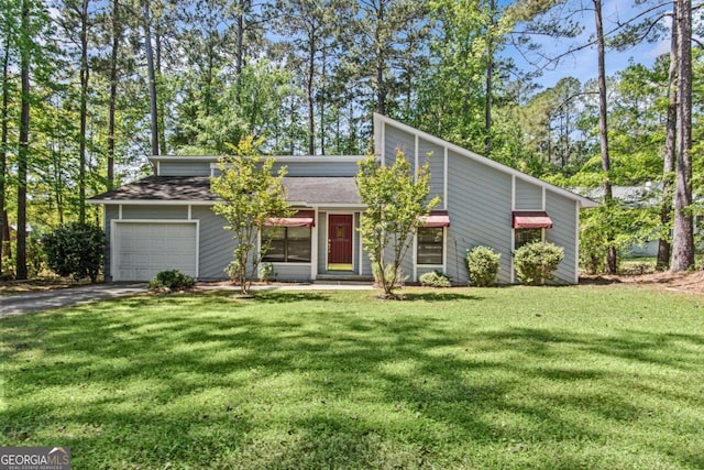 108 Ashwood Pt Unit 196, Eatonton, GA 31024 - mid-century inspired home featuring a garage, driveway, a front yard, and a shingled roof