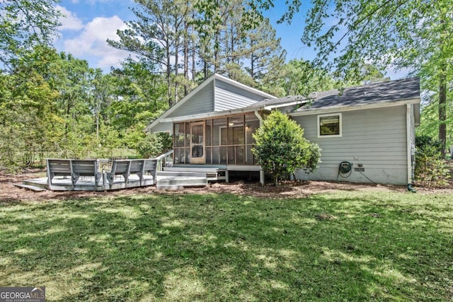 108 Ashwood Pt Unit 196, Eatonton, GA 31024 - rear view of property with a sunroom, a yard, and a wooden deck