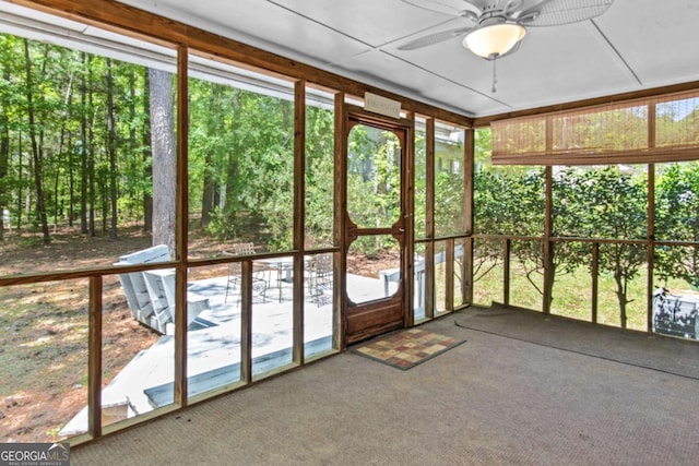 108 Ashwood Pt Unit 196, Eatonton, GA 31024 - unfurnished sunroom featuring ceiling fan and healthy amount of natural light