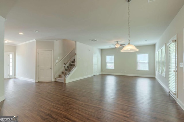 392 Dublin Way, Dallas, GA 30132 - unfurnished living room with dark wood-style floors, stairs, visible vents, and baseboards