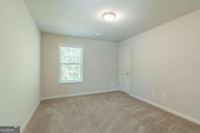 392 Dublin Way, Dallas, GA 30132 - unfurnished room with baseboards, visible vents, and carpet flooring