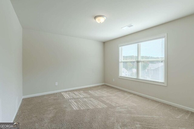 392 Dublin Way, Dallas, GA 30132 - unfurnished room featuring carpet flooring and baseboards