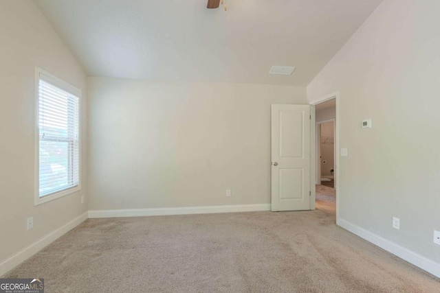 392 Dublin Way, Dallas, GA 30132 - carpeted spare room featuring ceiling fan, vaulted ceiling, and baseboards