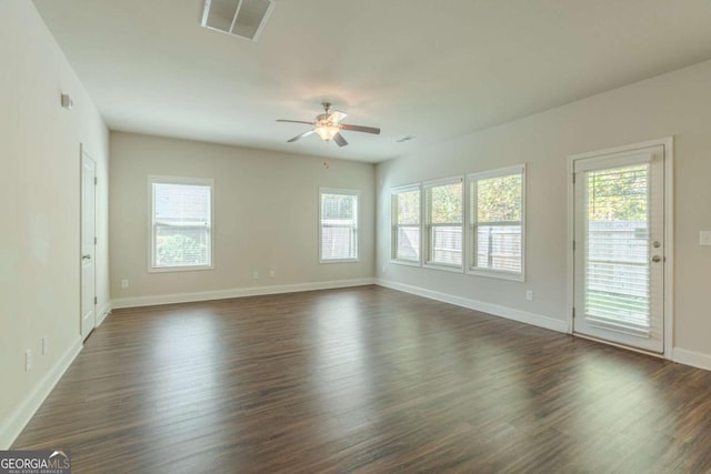392 Dublin Way, Dallas, GA 30132 - interior space with ceiling fan, baseboards, dark wood-style flooring, and a healthy amount of sunlight