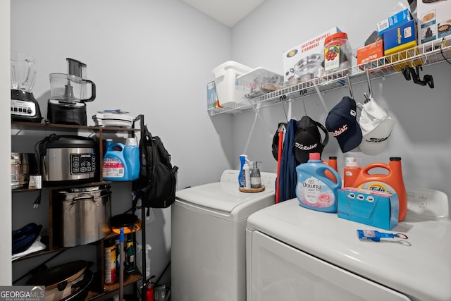 clothes washing area with laundry area and independent washer and dryer
