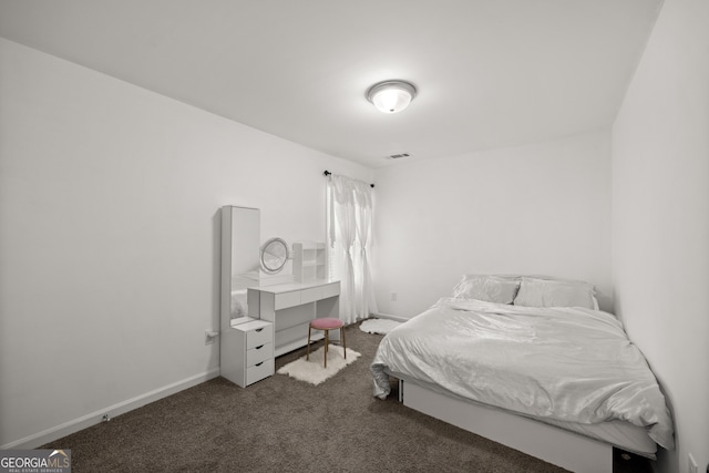bedroom featuring carpet, visible vents, and baseboards