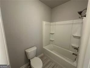 3421 Andover Way, Buford, GA 30519 - full bath featuring bathing tub / shower combination and toilet