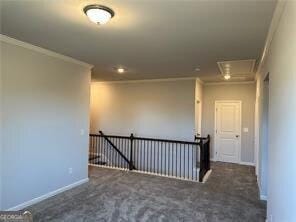 3421 Andover Way, Buford, GA 30519 - empty room with baseboards, attic access, carpet, and ornamental molding
