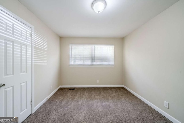 4442 Mercer Rd, Decatur, GA 30035 - unfurnished bedroom with baseboards, visible vents, and carpet flooring