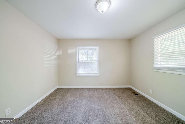 4442 Mercer Rd, Decatur, GA 30035 - carpeted empty room featuring visible vents and baseboards