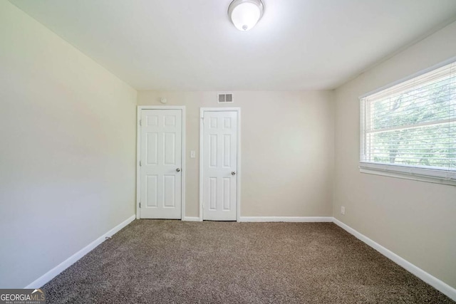 4442 Mercer Rd, Decatur, GA 30035 - spare room featuring baseboards, visible vents, and carpet floors