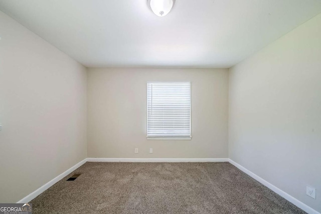 4442 Mercer Rd, Decatur, GA 30035 - spare room with baseboards, visible vents, and carpet flooring