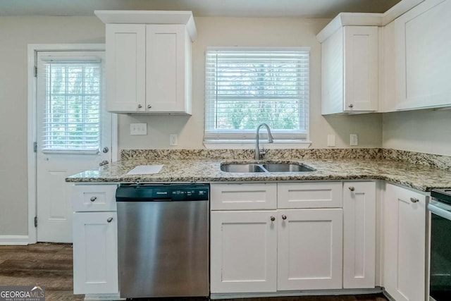 4442 Mercer Rd, Decatur, GA 30035 - kitchen with dark wood finished floors, stainless steel appliances, white cabinetry, and a sink