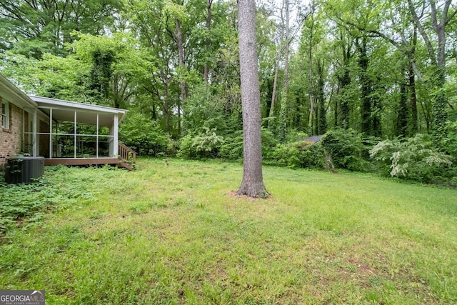 view of yard with central AC