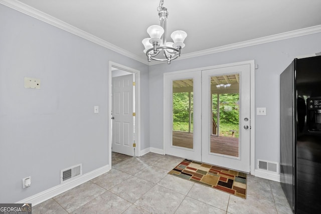 doorway with visible vents, crown molding, light tile patterned flooring, and a notable chandelier