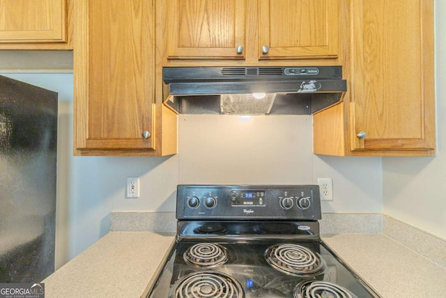 8051 Trinity Park Dr, Riverdale, GA 30296 - kitchen with black appliances, light countertops, and under cabinet range hood