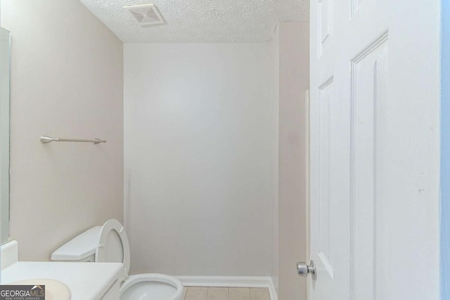 8051 Trinity Park Dr, Riverdale, GA 30296 - carpeted empty room with a textured ceiling, baseboards, and a healthy amount of sunlight