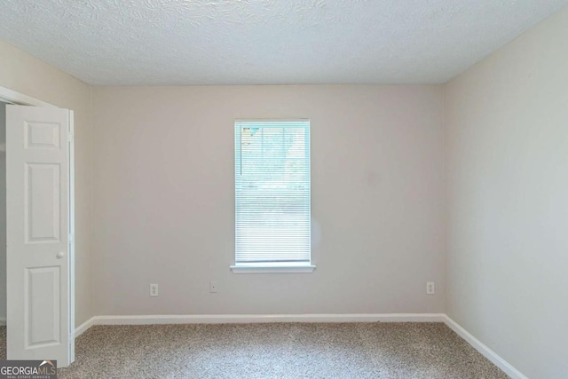 8051 Trinity Park Dr, Riverdale, GA 30296 - empty room featuring baseboards, a wealth of natural light, and carpet floors