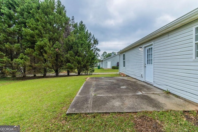 8051 Trinity Park Dr, Riverdale, GA 30296 - view of yard with a patio