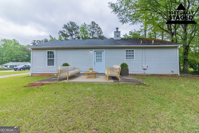 8051 Trinity Park Dr, Riverdale, GA 30296 - rear view of property with a patio, a chimney, and a lawn