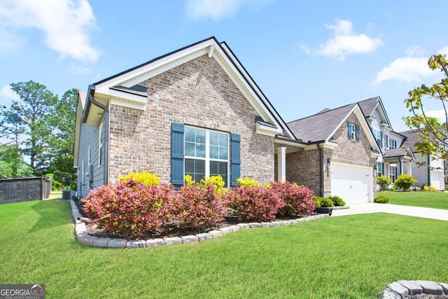 view of front of home featuring fence, stone siding, central AC, a front yard, and concrete driveway