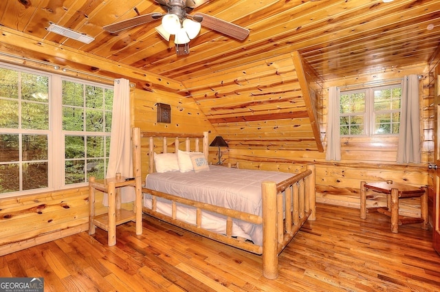 455 Old Cherokee Rd, Cleveland, GA 30528 - bedroom featuring wooden ceiling, wood walls, and light wood finished floors