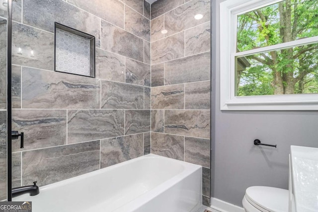 208 Silver Springs Cir SW, Atlanta, GA 30310 - bathroom featuring toilet, baseboards, walk in shower, and a tub to relax in