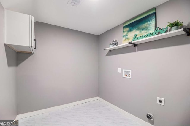 208 Silver Springs Cir SW, Atlanta, GA 30310 - laundry room with hookup for an electric dryer, baseboards, marble finish floor, and hookup for a washing machine