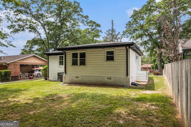 208 Silver Springs Cir SW, Atlanta, GA 30310 - rear view of property with a lawn, crawl space, and fence