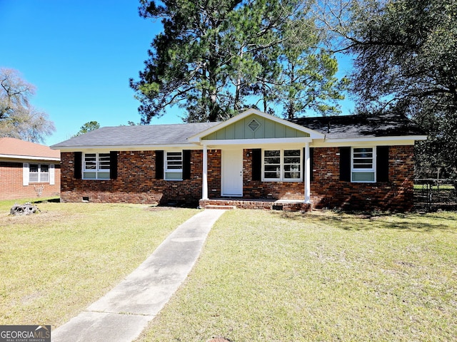 802 Colquitt Cir, Albany, GA 31707 - ranch-style home featuring a front lawn, board and batten siding, and brick siding