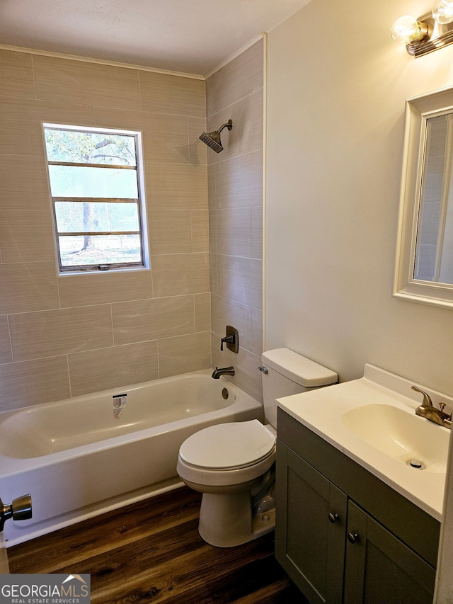 802 Colquitt Cir, Albany, GA 31707 - full bathroom with shower / tub combination, wood finished floors, vanity, and toilet