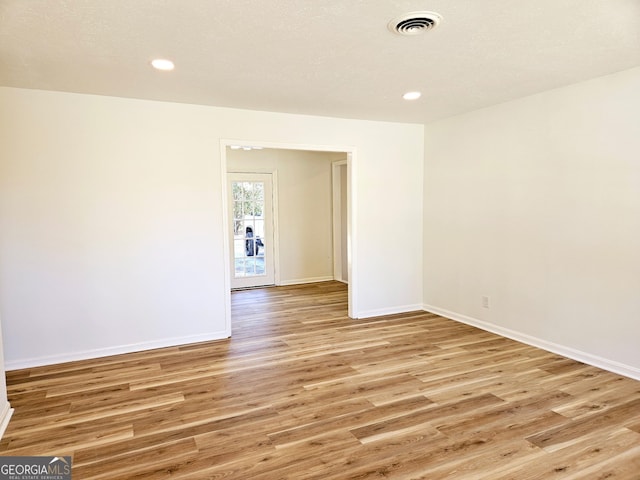 802 Colquitt Cir, Albany, GA 31707 - empty room featuring recessed lighting, visible vents, light wood-style flooring, and baseboards