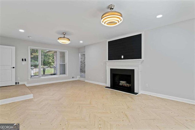 2023 Stoneleigh Dr, Stone Mountain, GA 30087 - unfurnished living room with baseboards, recessed lighting, visible vents, and a fireplace