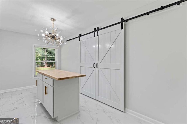 2023 Stoneleigh Dr, Stone Mountain, GA 30087 - interior space with marble finish floor, butcher block countertops, and a barn door