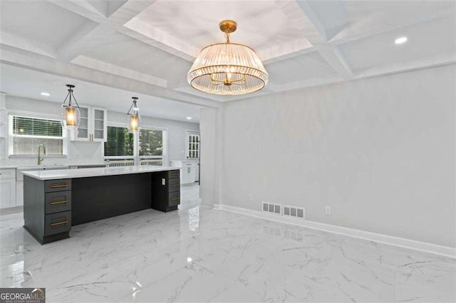 2023 Stoneleigh Dr, Stone Mountain, GA 30087 - kitchen featuring recessed lighting, a sink, coffered ceiling, visible vents, and light countertops