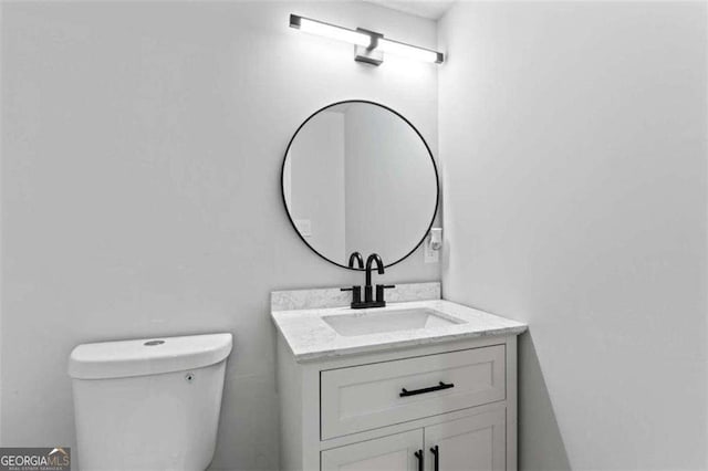 2023 Stoneleigh Dr, Stone Mountain, GA 30087 - half bathroom with toilet and vanity