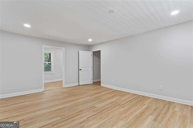 2023 Stoneleigh Dr, Stone Mountain, GA 30087 - spare room with baseboards, recessed lighting, and light wood finished floors