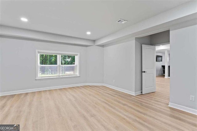2023 Stoneleigh Dr, Stone Mountain, GA 30087 - spare room with light wood-style floors, recessed lighting, visible vents, and baseboards