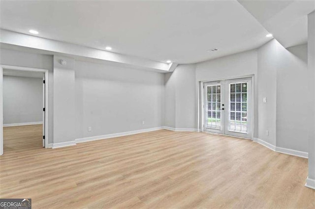 2023 Stoneleigh Dr, Stone Mountain, GA 30087 - below grade area with baseboards, recessed lighting, light wood-style floors, and french doors