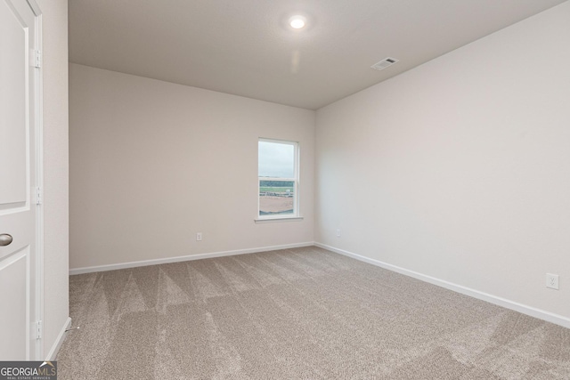 267 Oliver Dr, Locust Grove, GA 30248 - carpeted spare room with baseboards and visible vents