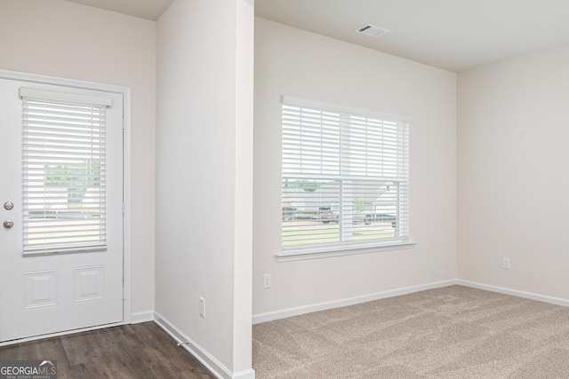 267 Oliver Dr, Locust Grove, GA 30248 - spare room with baseboards and visible vents