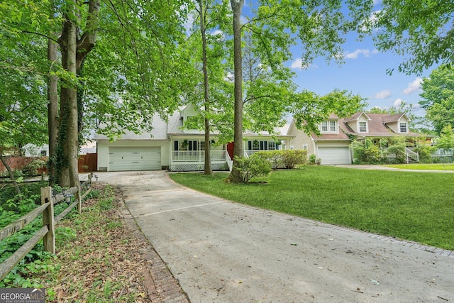 3979 Doral Cir, Atlanta, GA 30360 - view of front facade with concrete driveway and an attached garage
