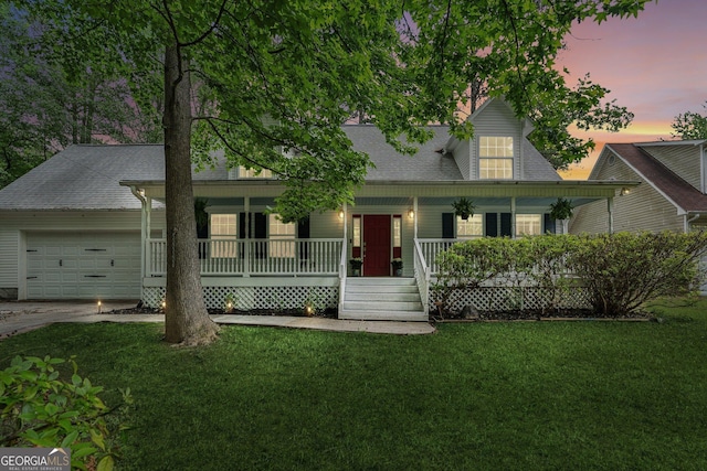 3979 Doral Cir, Atlanta, GA 30360 - view of front of house featuring covered porch, an attached garage, a front yard, a shingled roof, and driveway
