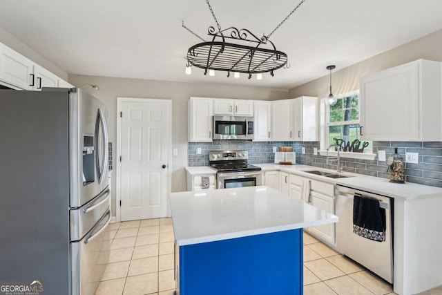 3979 Doral Cir, Atlanta, GA 30360 - kitchen featuring stainless steel appliances, a sink, light countertops, tasteful backsplash, and white cabinetry