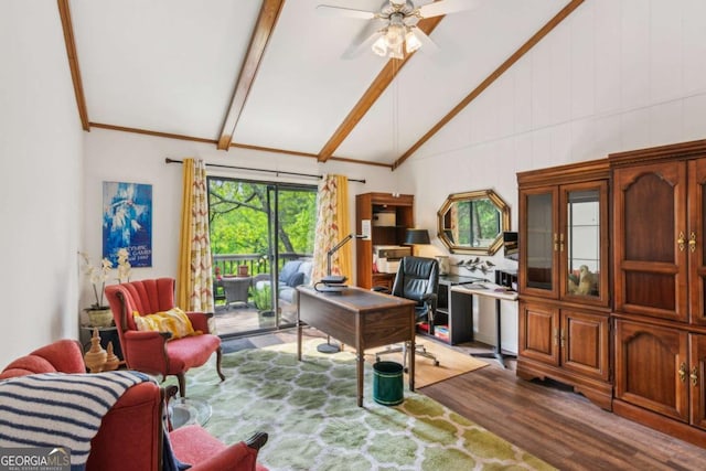 office with beamed ceiling, ceiling fan, high vaulted ceiling, ornamental molding, and wood finished floors