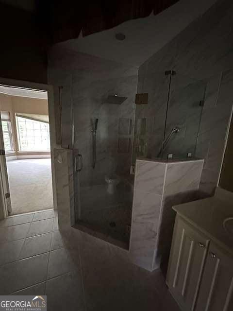 8010 Scudder Way, Ball Ground, GA 30107 - full bath with a shower stall, vanity, and tile patterned flooring