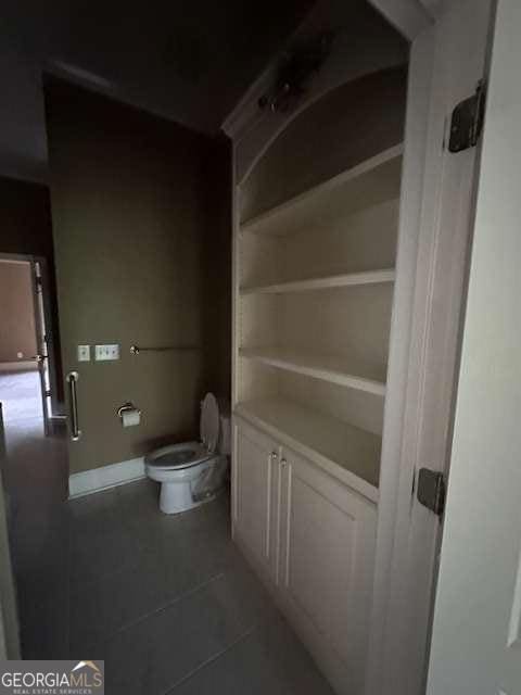 8010 Scudder Way, Ball Ground, GA 30107 - bathroom with tile patterned floors and toilet