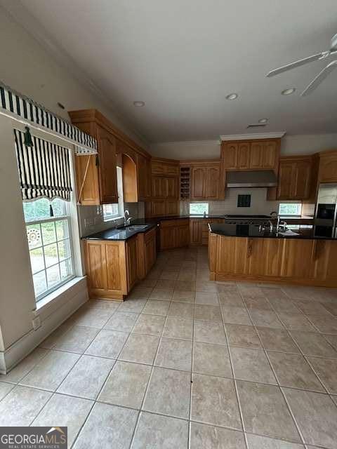 8010 Scudder Way, Ball Ground, GA 30107 - kitchen featuring light tile patterned floors, refrigerator, and dark countertops