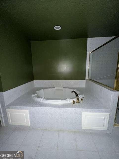 8010 Scudder Way, Ball Ground, GA 30107 - bathroom with a bath and tile patterned flooring